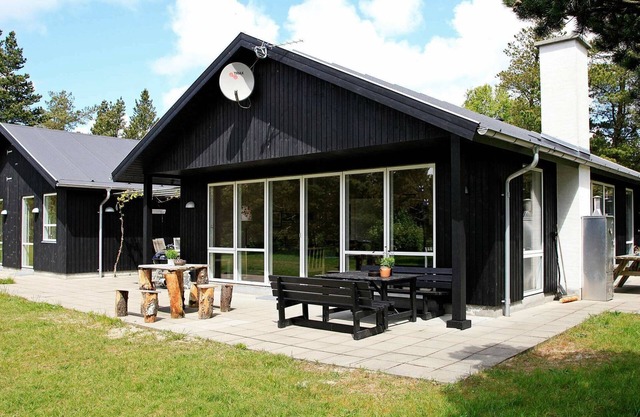 Hermosa casa de vacaciones en Oksbøl con jacuzzi privado