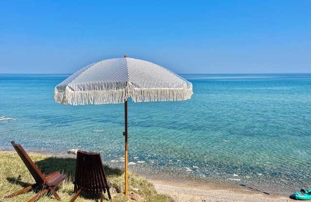 125 ft of Private BEACHFRONT with large, secluded yard & spectacular views!