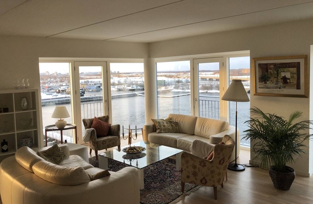 125 m2 Waterfront Apartment With Panoramic Water View in Copenhagens Venice