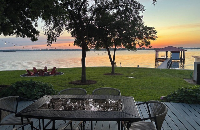 Enjoy a fabulous weekend with160' of lakefront, fire pit, game room, & more