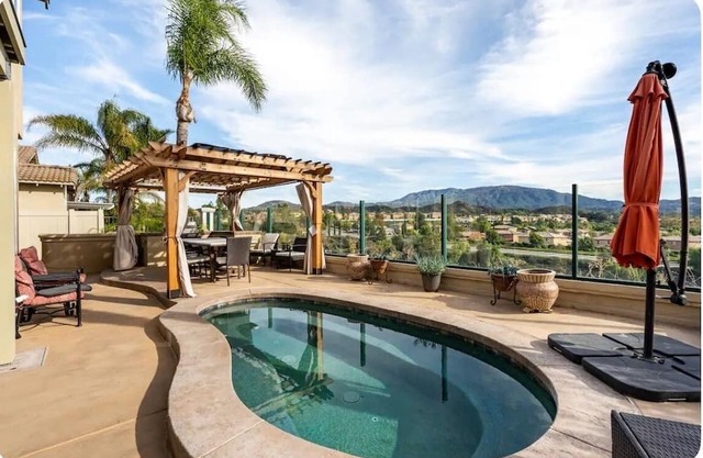 180-degree mountain views from heated spa to overlook the exquisite golf course.
