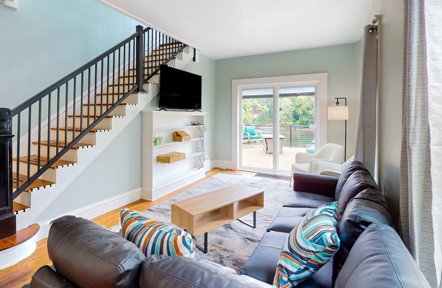 1900s home with river views, updated interior, deck, and gas grill - near parks
