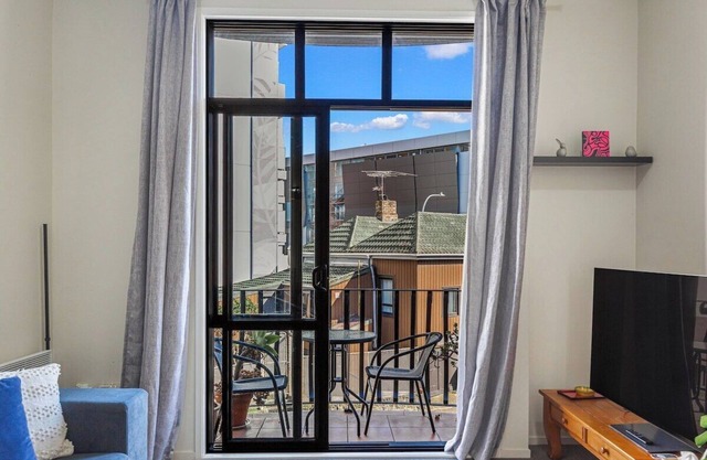 1BR Haven with Balcony & Parking