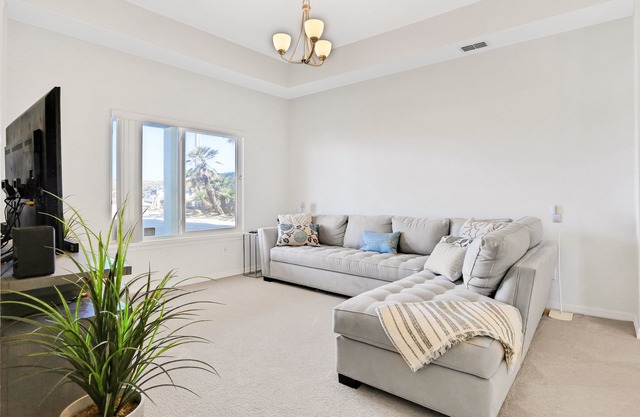 1st-floor beachfront home with outdoor shower, patio, grill, ocean & beach views