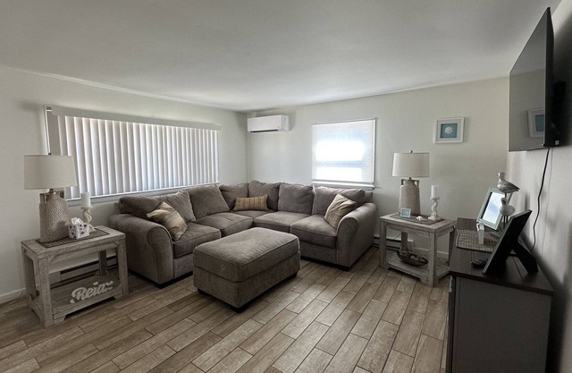 2 bed 1 bath condo one block walk to the beach!