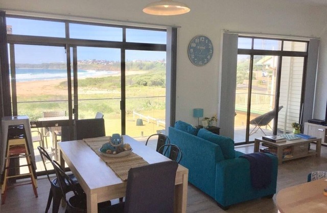 2 bedroom absolute Beachfront Apartment with your own large backyard and BBQ