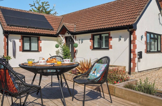Nestled in the peaceful Combe St Nicholas, this charming bungalow offers comfort and tranquillity.
