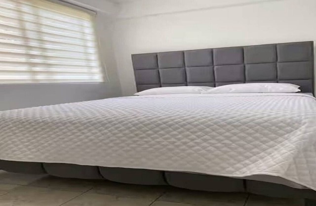 2-bedroom apartment in peaceful Santo Domingo with WiFi, AC