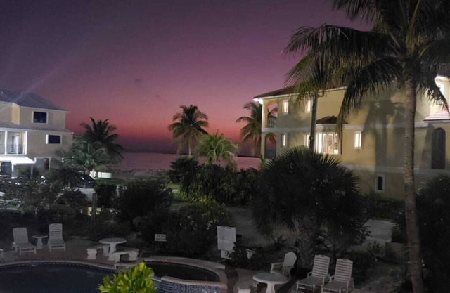 2-bedroom condo in oceanfront complex in Freeport with pool, WiFi, beach chairs.