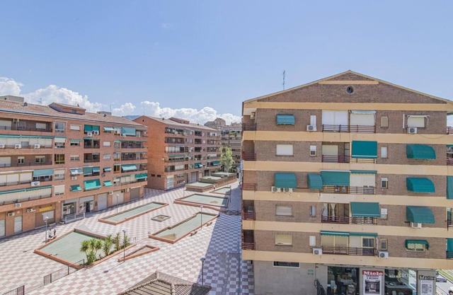 Retiro Acogedor en Granada: Apartamento de 2 Habitaciones con Terraza