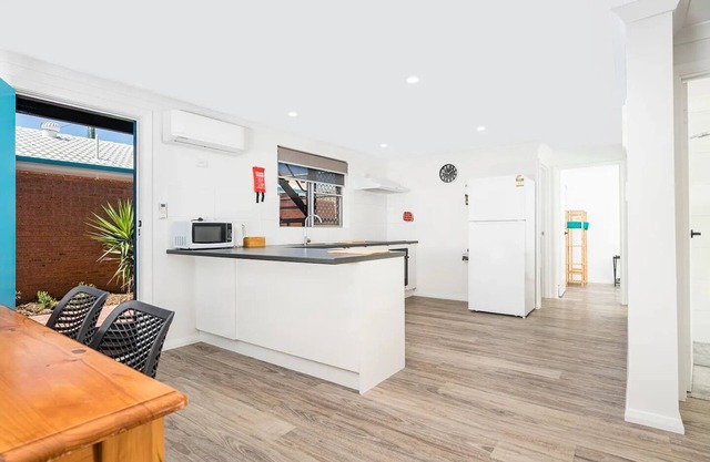 2 Bedroom Unit Central, 5 minutes walk to pristine beaches! Newly renovated