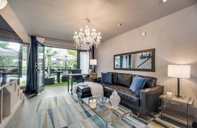 2-level condo w/ king bed, pool view, and private patio.