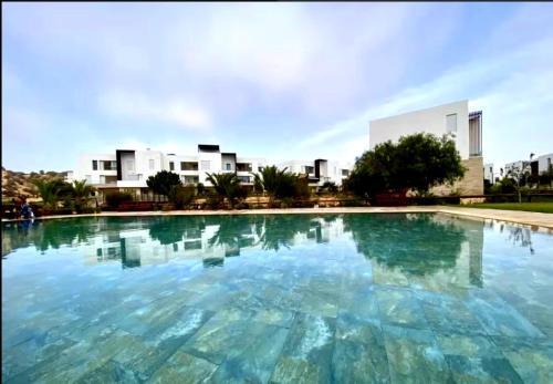 2 minutes de la plage , Résidence Tamourrit, Taghazout Bay , vue mer , golf , piscine