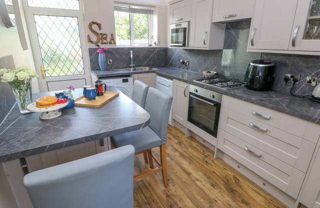 22 MORLAN TERRACE, pet friendly, with a garden in Burry Port