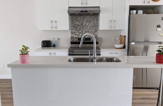 2Flrs -2 of 3 BR-3BA/ open concept full kitchen with dining space & living room.