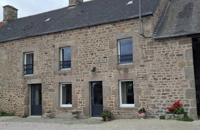3.5 Kms from Barfleur, old farmhouse with wooded grounds and south-facing veranda.