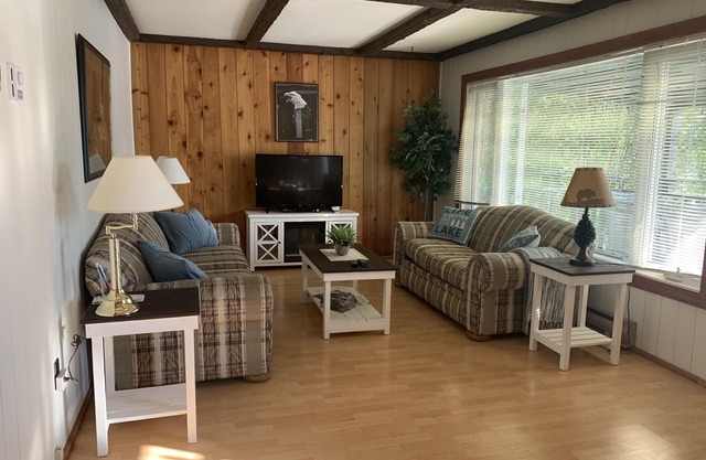 3 bedroom 2 bath cottage semi lake front with beach, dock and awesome views