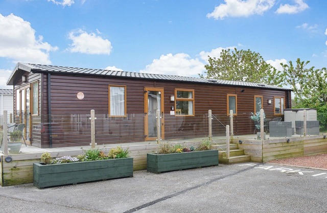Escape to Cate’s Cozy Cabin, a charming three-bedroom wood cabin near Carlisle and Penrith.