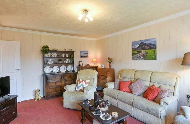 A cosy house bursting with character, situated in the charming Gwynedd village of Bryncrug.