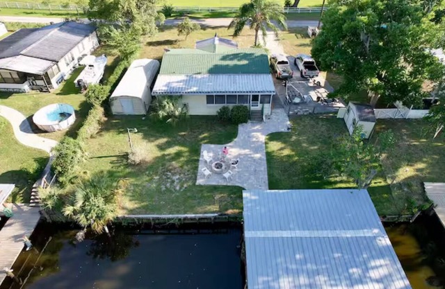 3 BR 2 BA House w/Dock on Deep Canal in Bass Capital