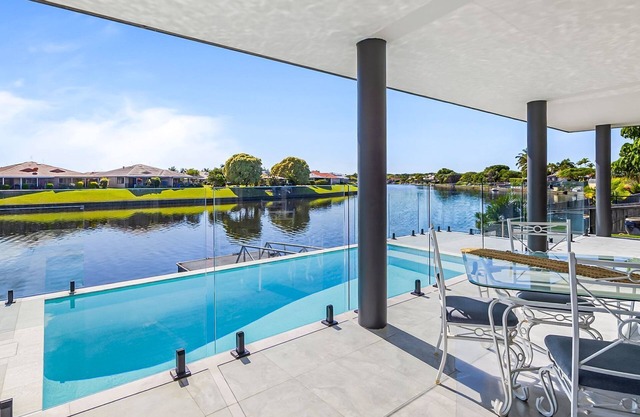 4 bedroom 3 bathroom house on canal, sleeps 12, pool