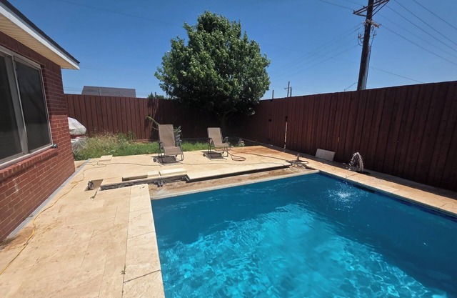 4-bedroom house in wonderful Lubbock with AC, WiFi, and swimming pool