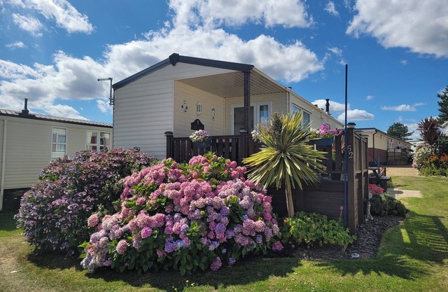 4 Berth Holiday Caravan con impresionantes vistas al mar 5 ☆ calificado con gran terraza exterior