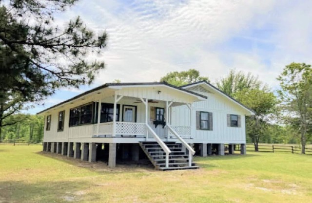 40 Acres 4 Bedroom 4 full bathroom Home with a Pond stocked with Fish & RV Port