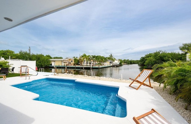 4BR Sombrero Beach House on Canal w Dock & Pool