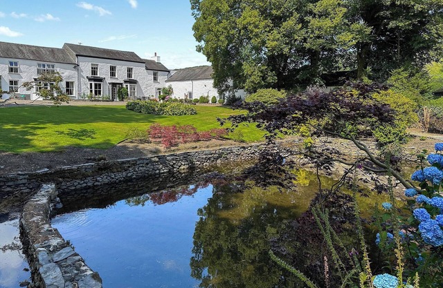 We love this elegant 18th-century property, set in beautiful grounds and woods.