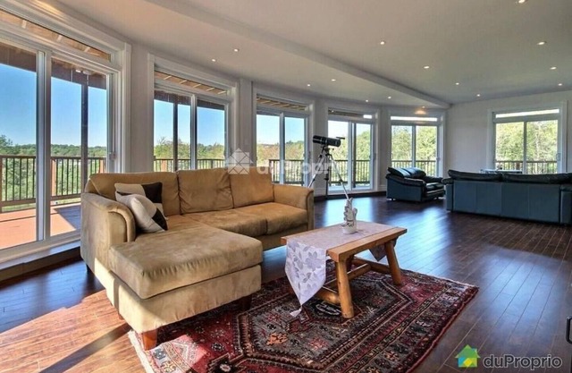 Gran chalet Sutton, con lago privado