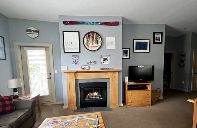 5 minute walk to lifts and Stratton Village! Cozy fireplace with a private patio