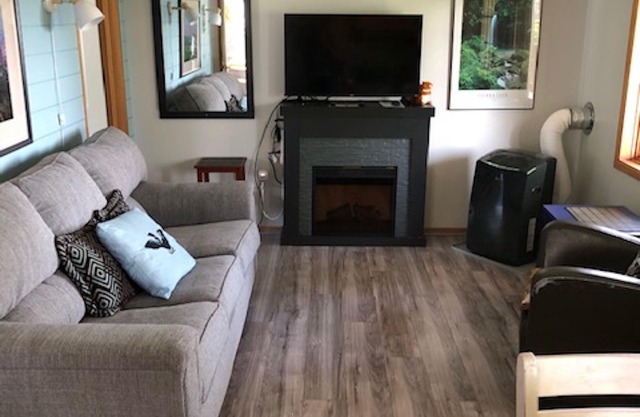5 minutes from Hwy 400. 155 feet of waterfront, sandy shoreline with docking.