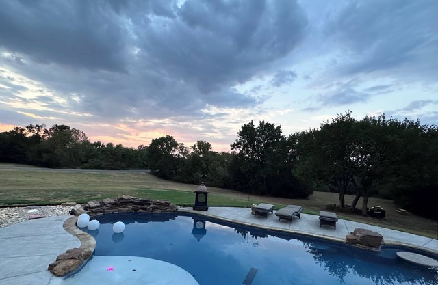 6 bedroom luxury oasis on 3 acres.