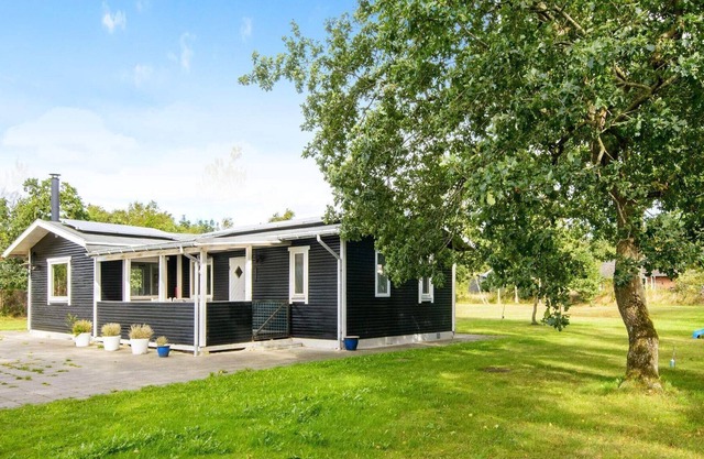Casa de vacaciones moderna en Kolind con terraza cubierta