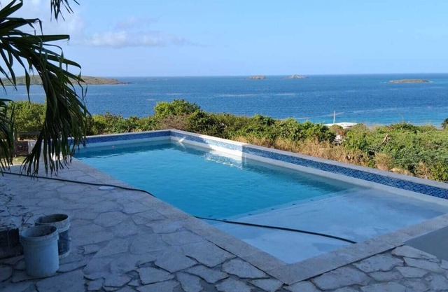 7 minute walk to Zoni beach AC. 3 Bedrooms for 6. 33x15' pool with an oceanview