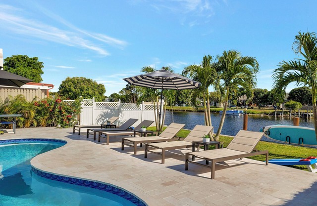 796 Serene 4BR Villa: Heated Pool, Tiki Hut & Waterfront Views in Delray Beach!