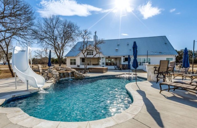 8 Acre Private Hilltop Estate with pool, fire pit, hot tub and game room!