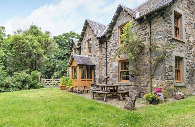 A beautiful former estate cottage, awash with character, nestling within its own ancient woodland.