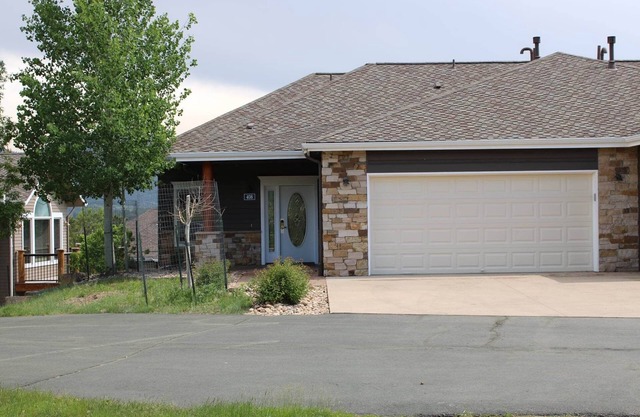 A beautiful mountain getaway with hot tub, large deck, and mountain/lake views!