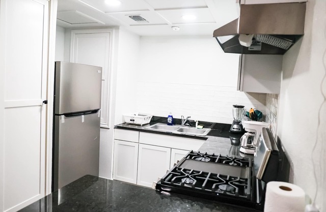 A cozy apartment at the center of a vibrant oil city, a home away from home.