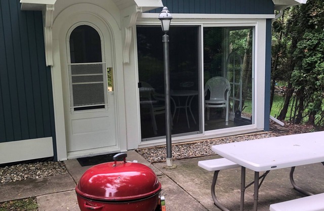 A cozy little cottage located one block from Lake Michigan's Newcome beach