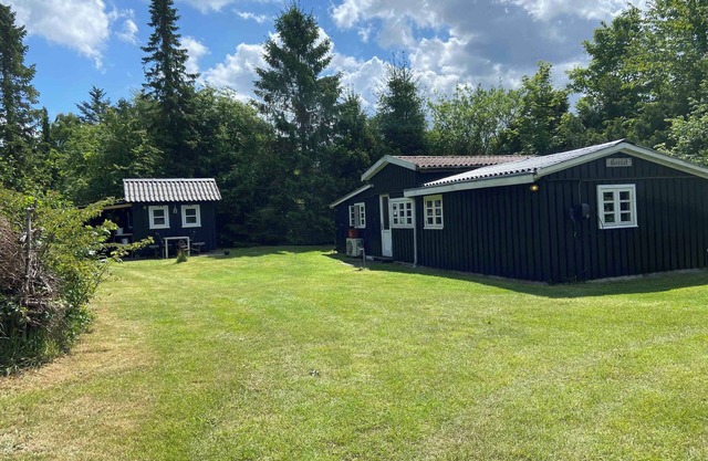 A cozy older summerhouse on a small island