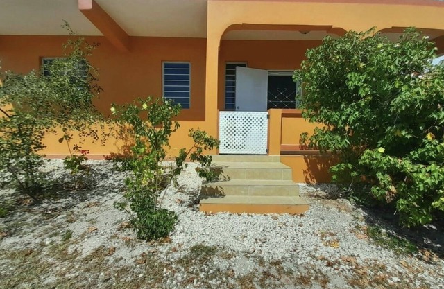 A Gem hidden between the historic Road Bay Salt Pond and a white sandy beach.