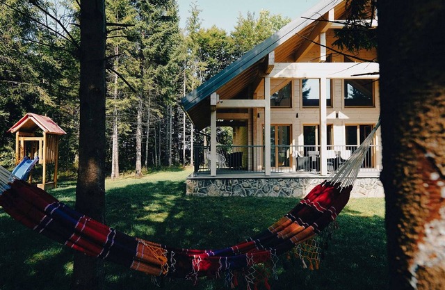 A luxury mountain cabin in Stari Laz featuring a finnish sauna