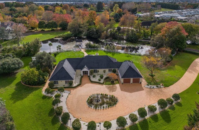 A Majestic Slice of Heaven with a private lake!