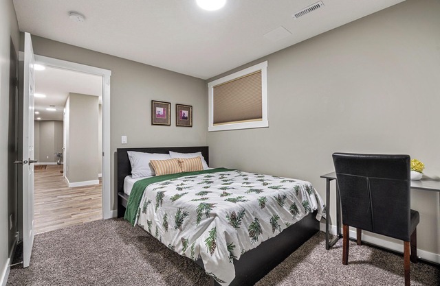 A modern 2-bedroom suite, with laundry, and wet bar(Stove unavailable for now)