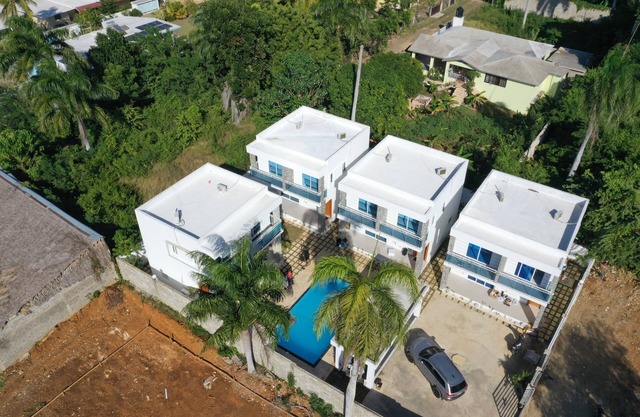 A modern 2-bedroom villa with pool and lounge area