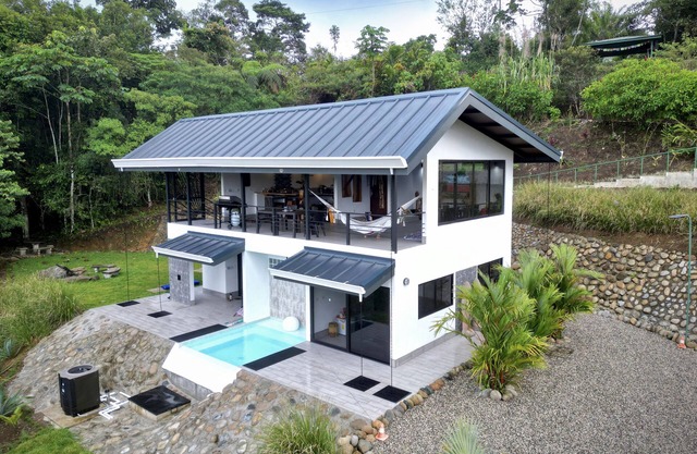 A modern and remote retreat, where nature thrives amidst contemporary comforts.