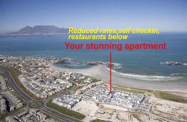 A Modern unit, self checkin, restaurants and shops below